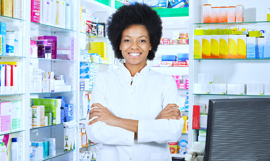smiling pharmacist in the pharmacy